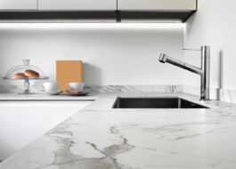 close-up-worktop-modern-kitchen-foreground-steel-sink-tap